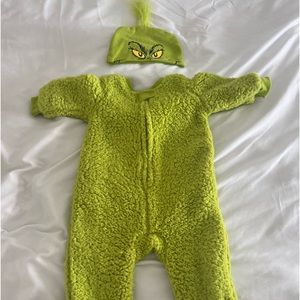 The Grinch one piece Hooded jumpsuit 
Used 1 time